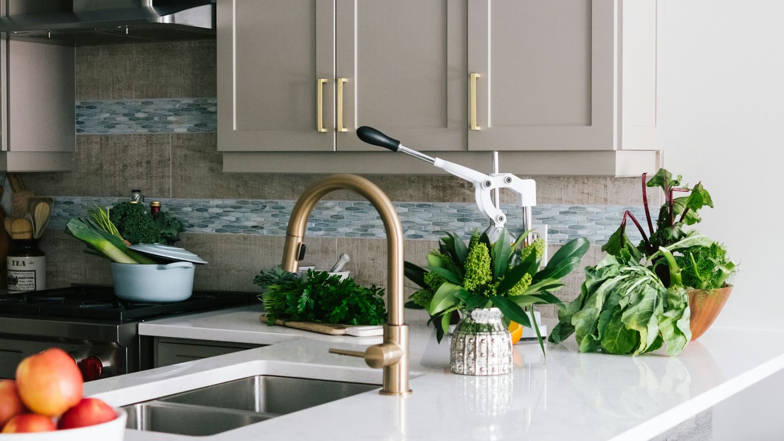 Modern remodeled kitchen with new cabinets, countertop, and fixtures
