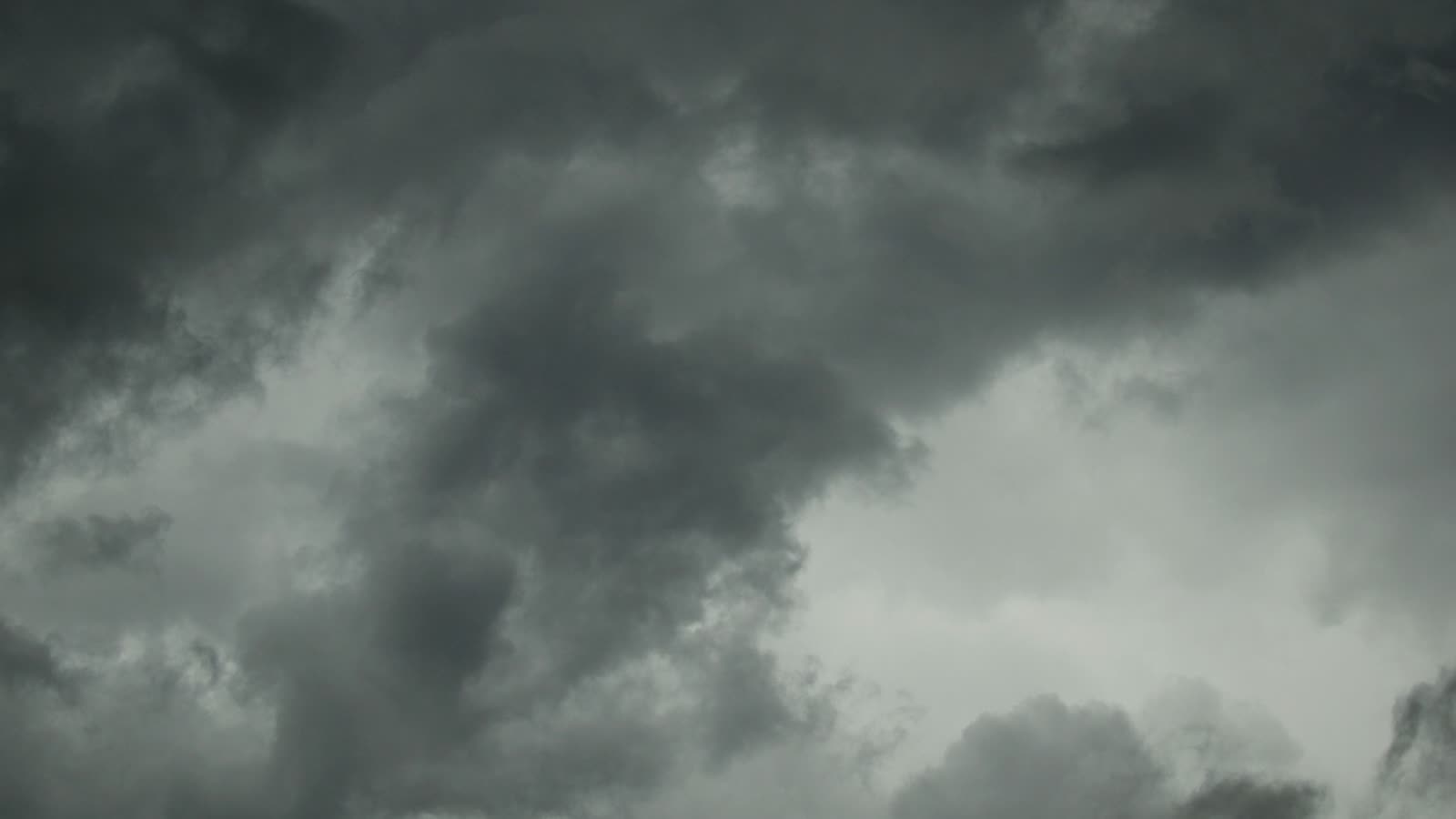 Dark, dramatic storm clouds gathering in the sky before a hurricane